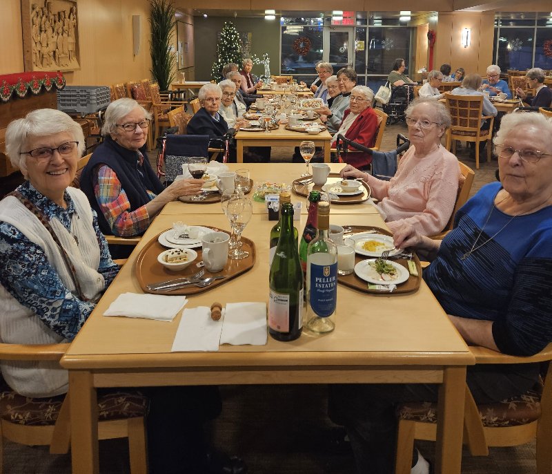 Sisters sharing meal at Immaculate Conception Feast